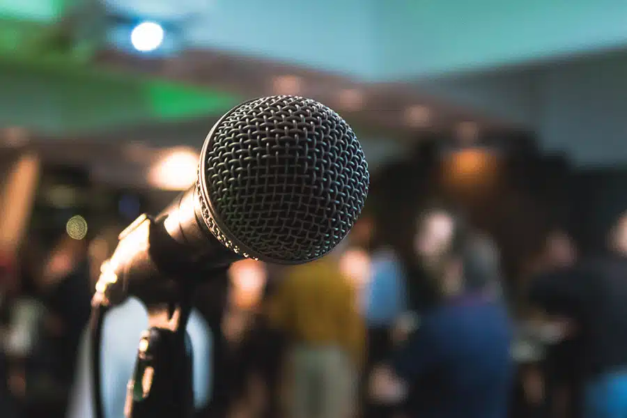 Close up of microphone on stage in a pub