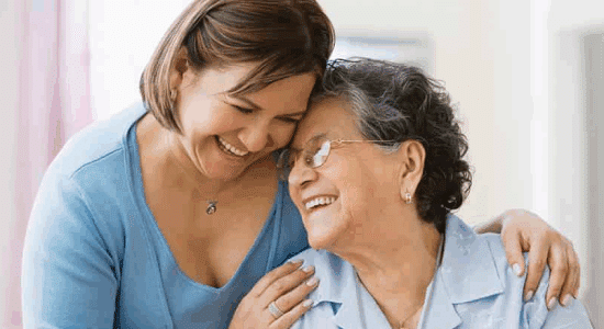 two women hugging