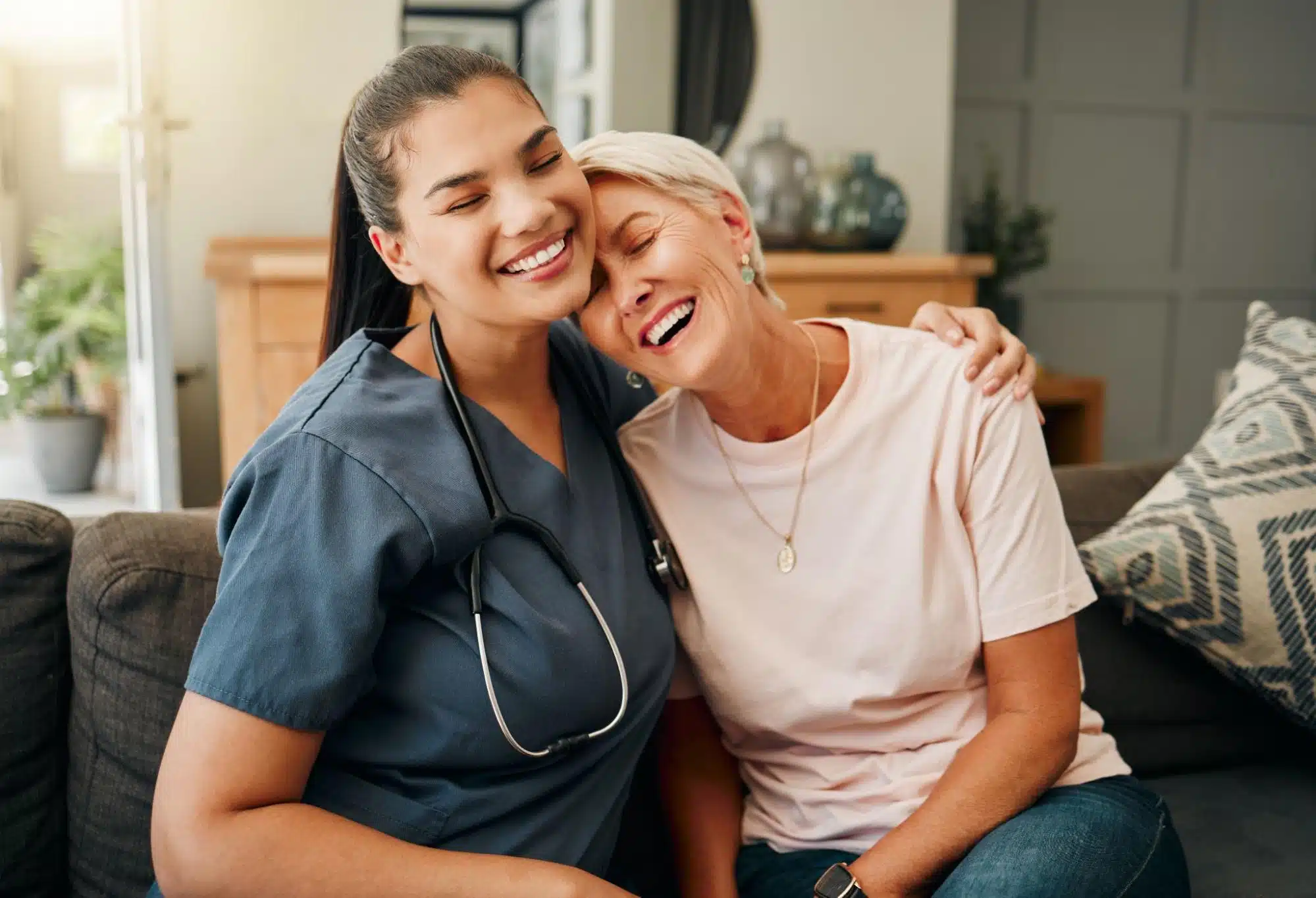 Nurse and patient hugging