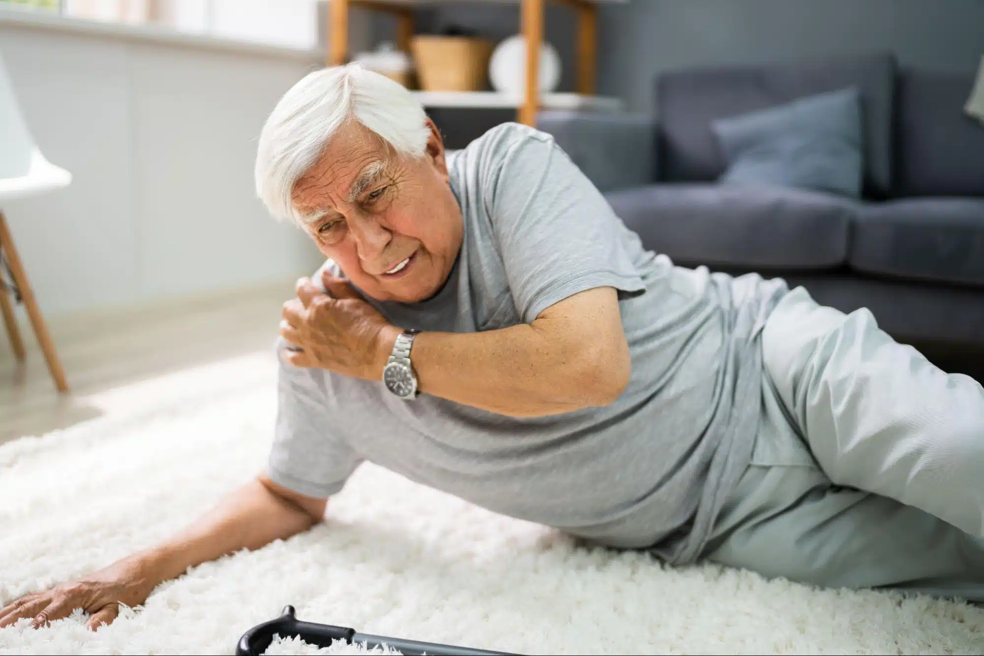 Senior on the ground with an injured shoulder