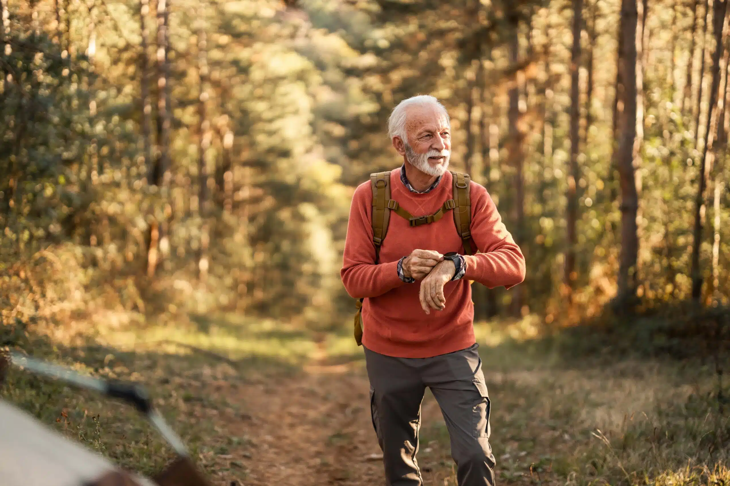 Senior walking on a trail