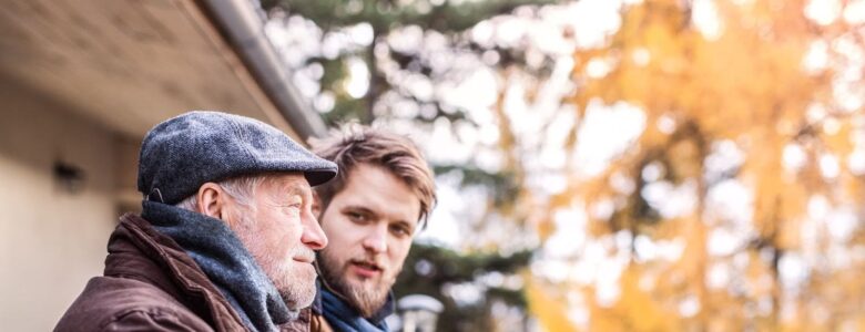 Father and son outside talking