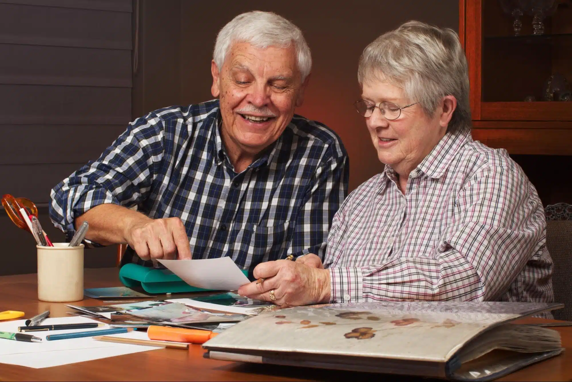 Two seniors doing arts and crafts